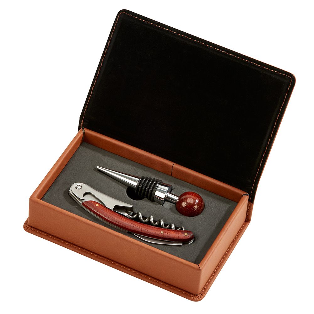 Caramel leatherette bar tool set featuring a corkscrew and bottle stopper in an elegant box.