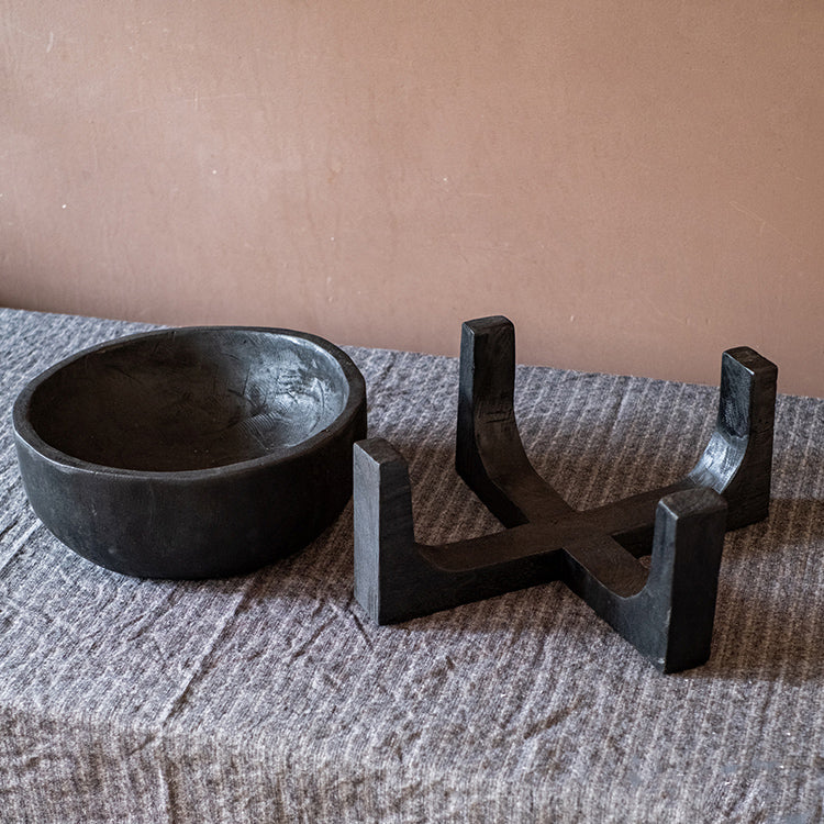 Carbonized wood plant bowl with stand, featuring a dark ashen black finish and minimalist design, ideal for decorative arrangements.