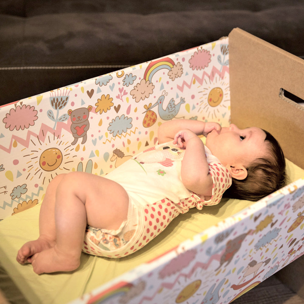 MINION Cardboard Baby Cradle with mattress, eco-friendly design, lightweight and practical for infants.