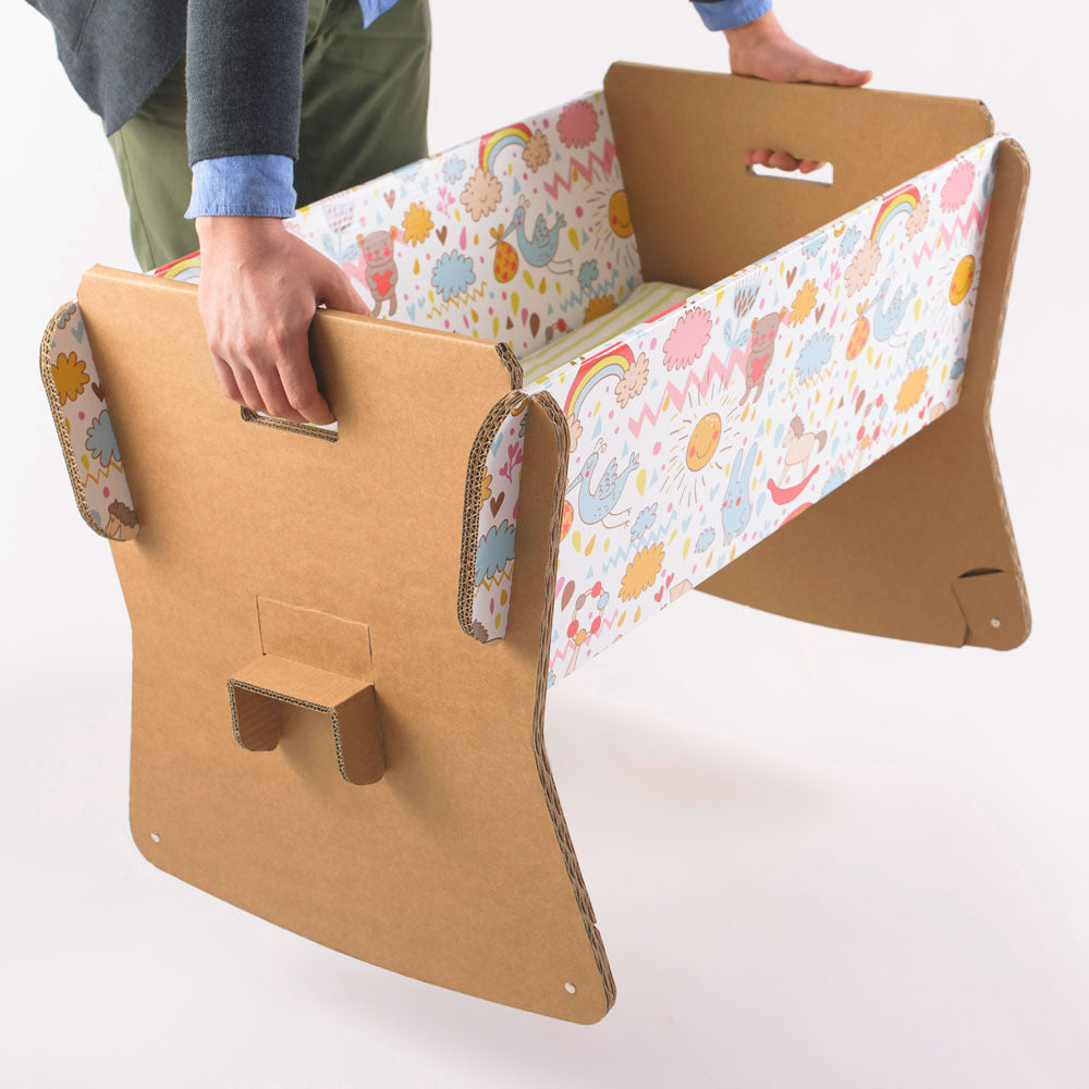 MINION Cardboard Baby Cradle with mattress, eco-friendly design, lightweight and practical for infants.