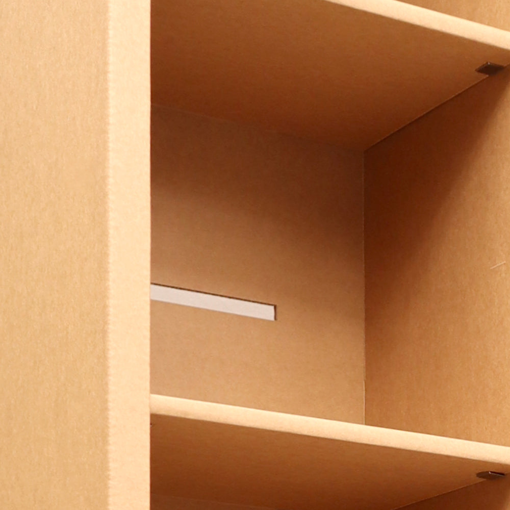 Cardboard Bookcase with Drawer HARALD featuring six artistic printed drawers, showcasing a unified design.