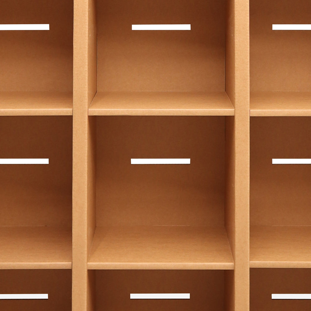 Cardboard Bookcase with Drawer HARALD featuring six artistic printed drawers, showcasing a unified design.