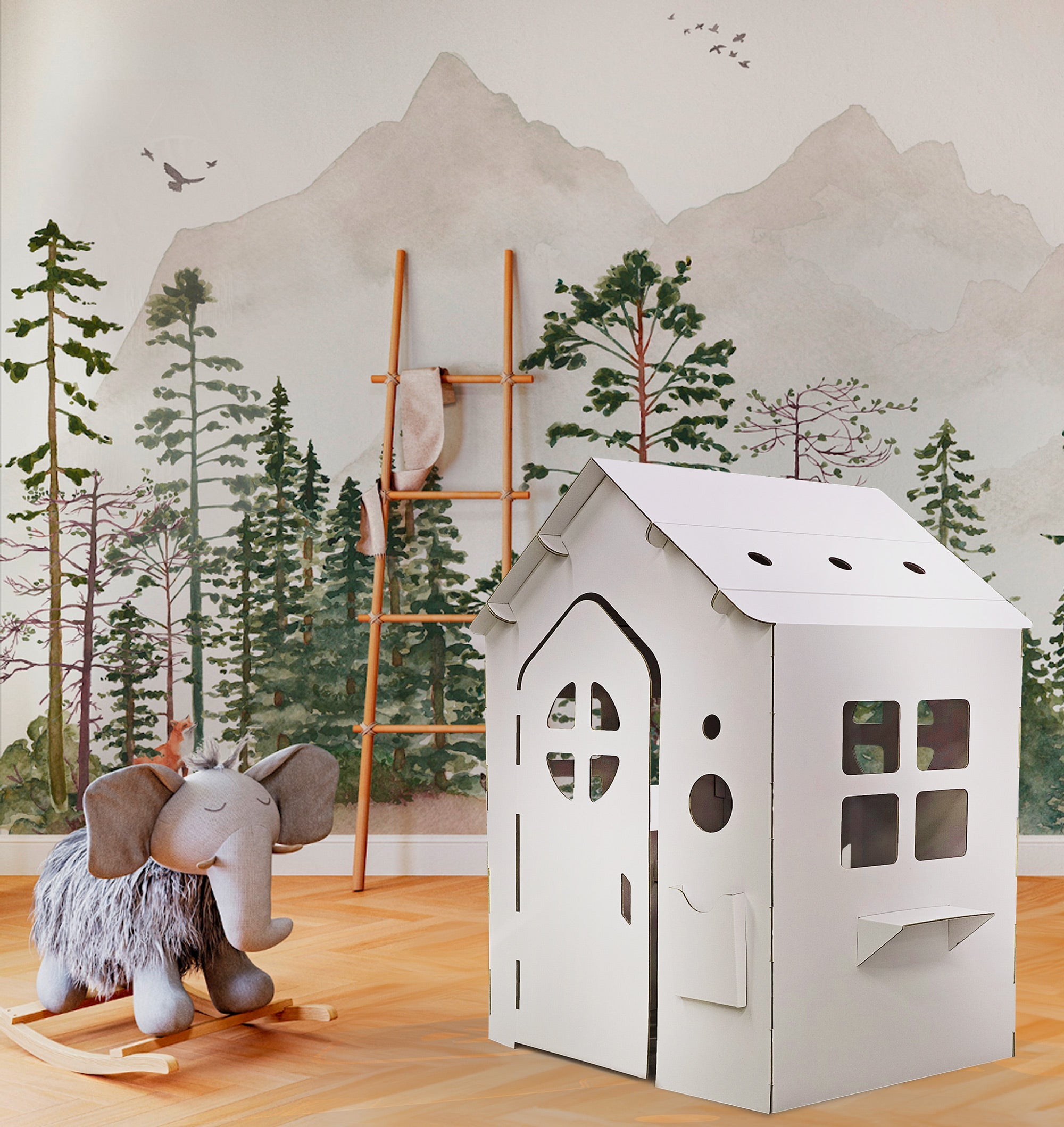 Cardboard playhouse WONDERLAND in white, featuring doors, windows, and a mailbox, designed for children's imaginative play.