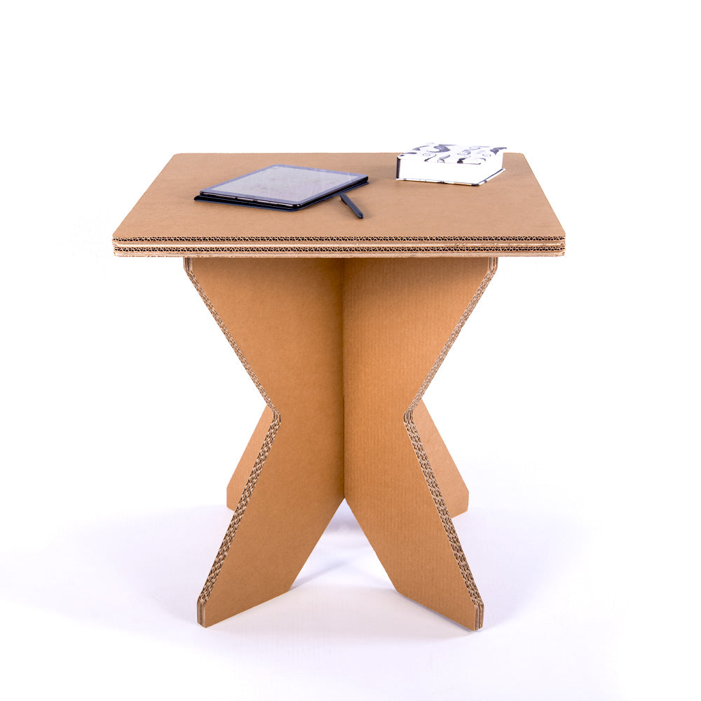 Cardboard Square Table DONNA in natural beige color, showcasing its lightweight and demountable design, perfect for various settings.