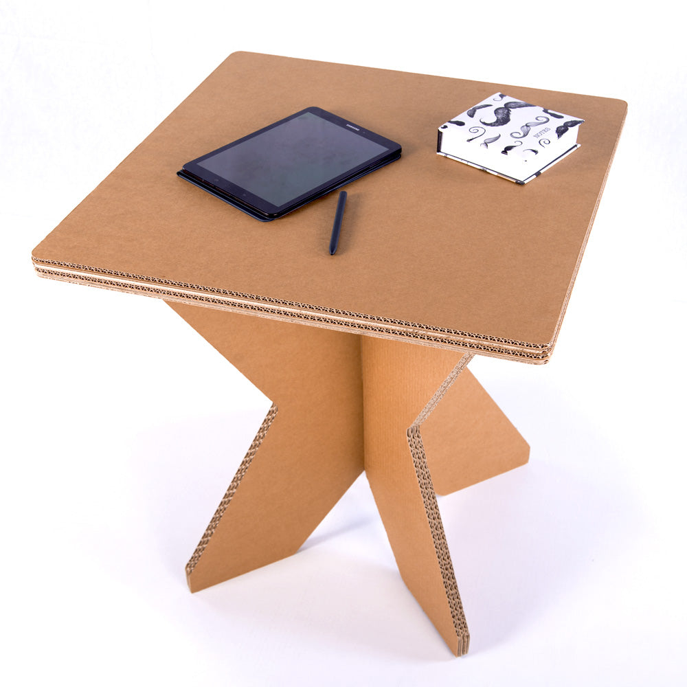 Cardboard Square Table DONNA in natural beige color, showcasing its lightweight and demountable design, perfect for various settings.