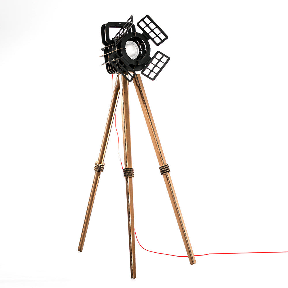 Cardboard Tripod Projector SHOW featuring a stylish design with a spotlight illuminating an object, made from colored corrugated cardboard.