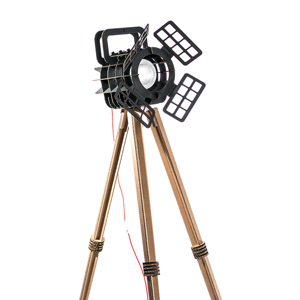 Cardboard Tripod Projector SHOW featuring a stylish design with a spotlight illuminating an object, made from colored corrugated cardboard.