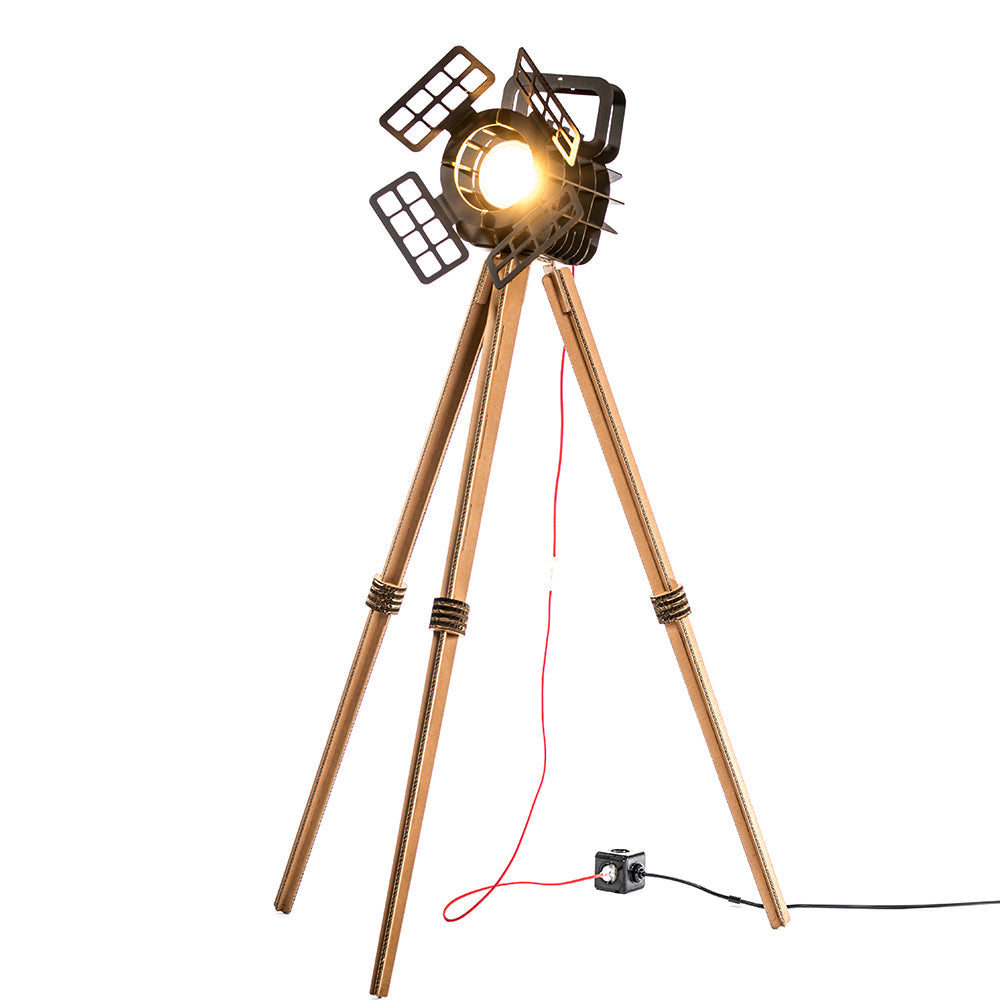 Cardboard Tripod Projector SHOW featuring a stylish design with a spotlight illuminating an object, made from colored corrugated cardboard.