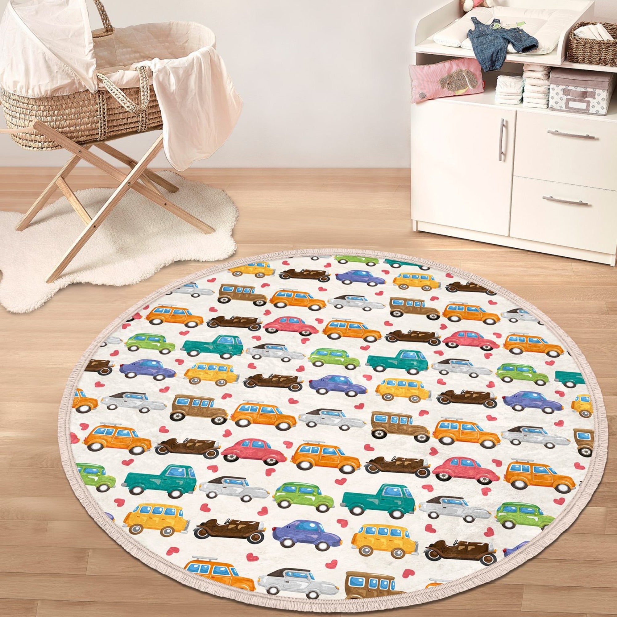 Colorful round rug featuring a playful car design, perfect for kids' rooms and nurseries.