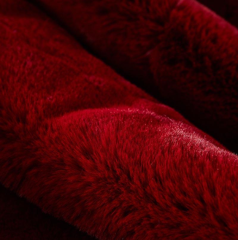 Cassilda Luxury Red Chinchilla Faux Fur Throw Blanket showcasing its plush texture and vibrant red color, perfect for home decor.