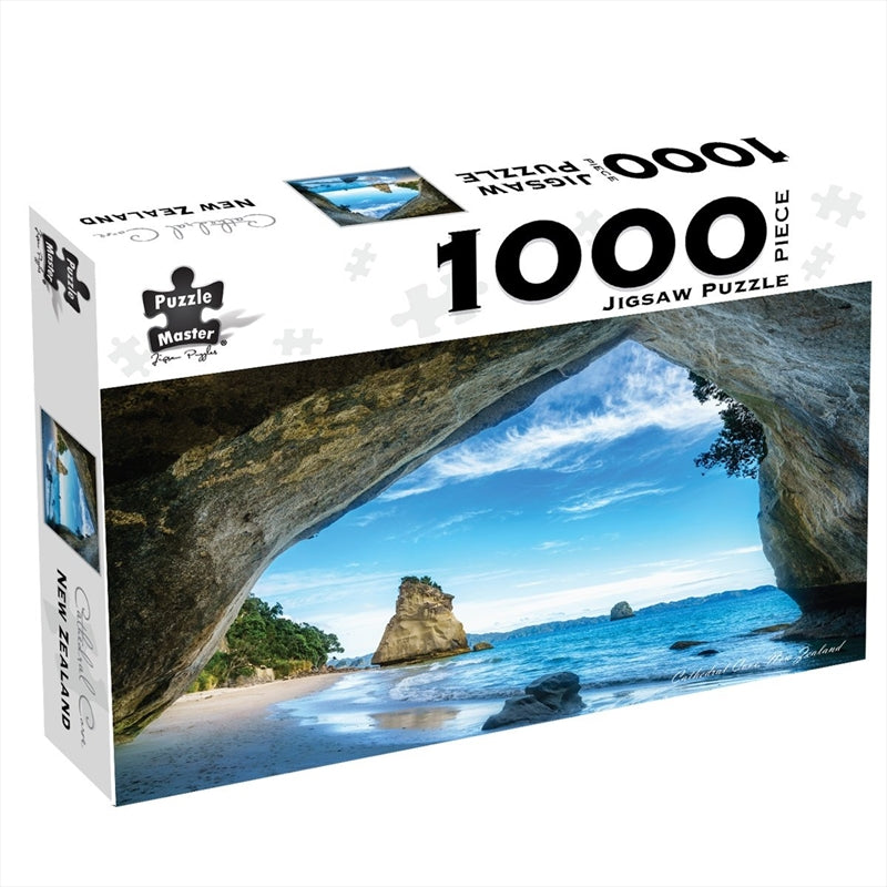 A beautifully designed 1000 piece jigsaw puzzle featuring the stunning scenery of Cathedral Cove in New Zealand, showcasing its iconic rock formations and clear waters.