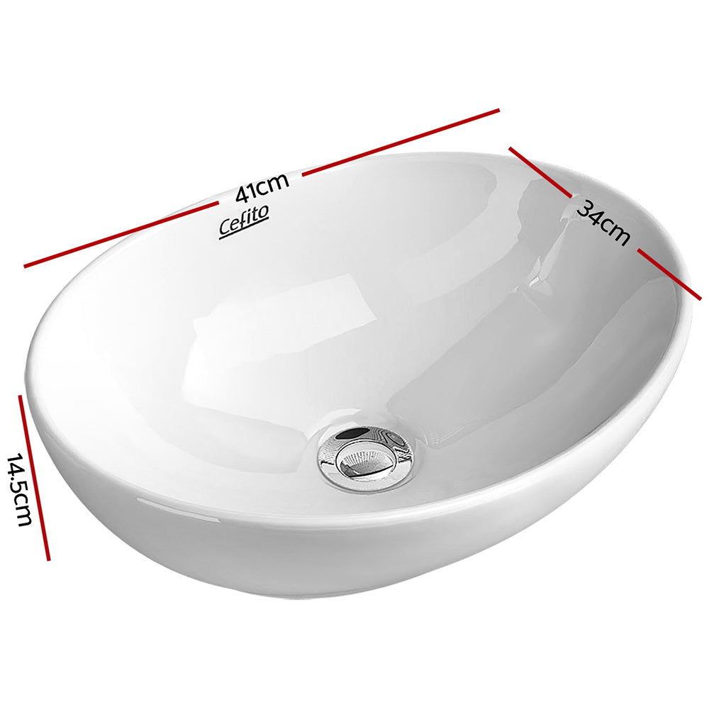 Cefito Ceramic Oval Sink Bowl in White, showcasing its elegant design and high gloss finish.