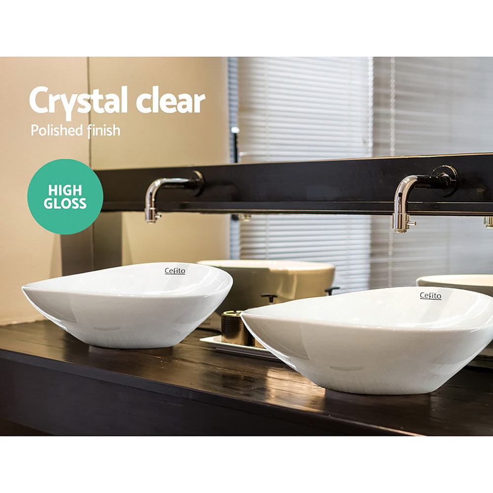 Cefito Ceramic Oval Sink Bowl in White, showcasing its elegant design and high gloss finish.