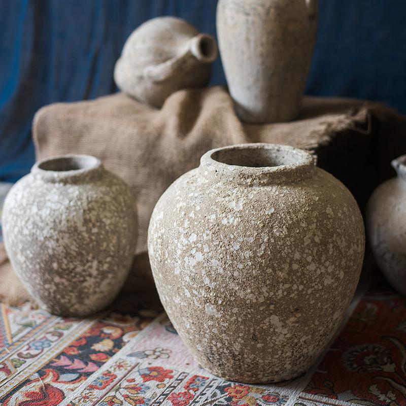 Handmade Cement Pot in Pompeii Style, featuring intricate designs and earthy colors, perfect for decorative use.