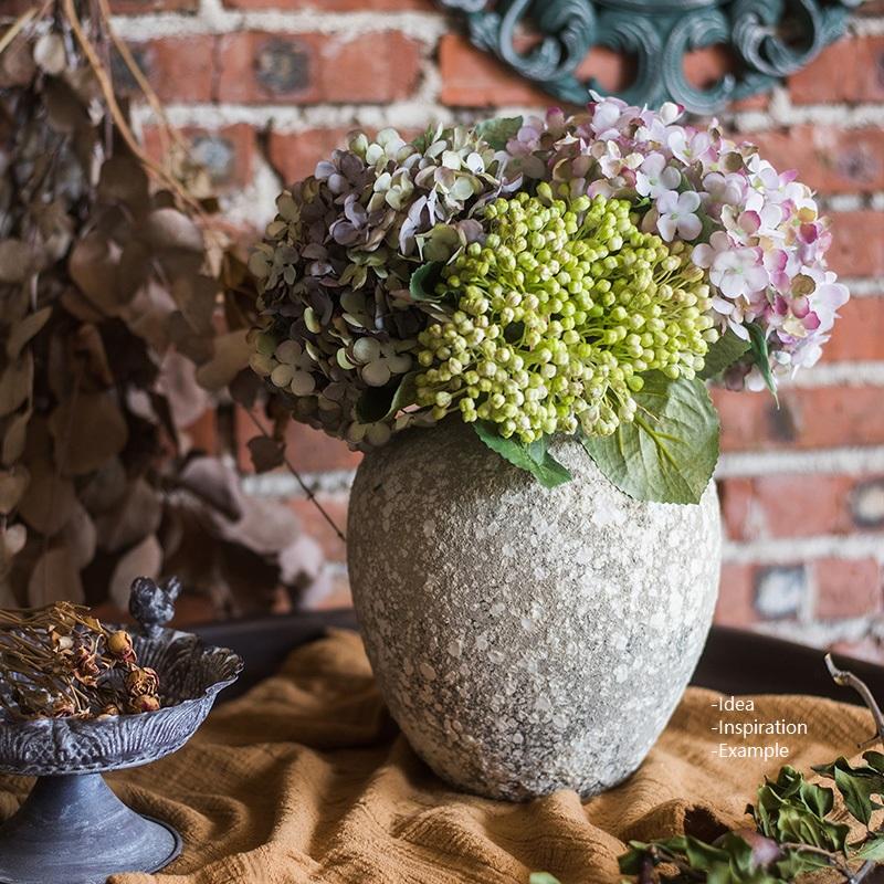 Handmade Cement Pot in Pompeii Style, featuring intricate designs and earthy colors, perfect for decorative use.