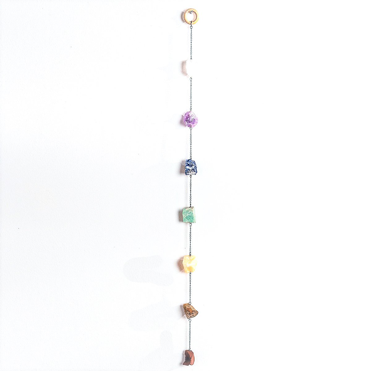 Chakra 24" Wall Hanging featuring seven natural stones for chakra alignment, handcrafted in Brazil.