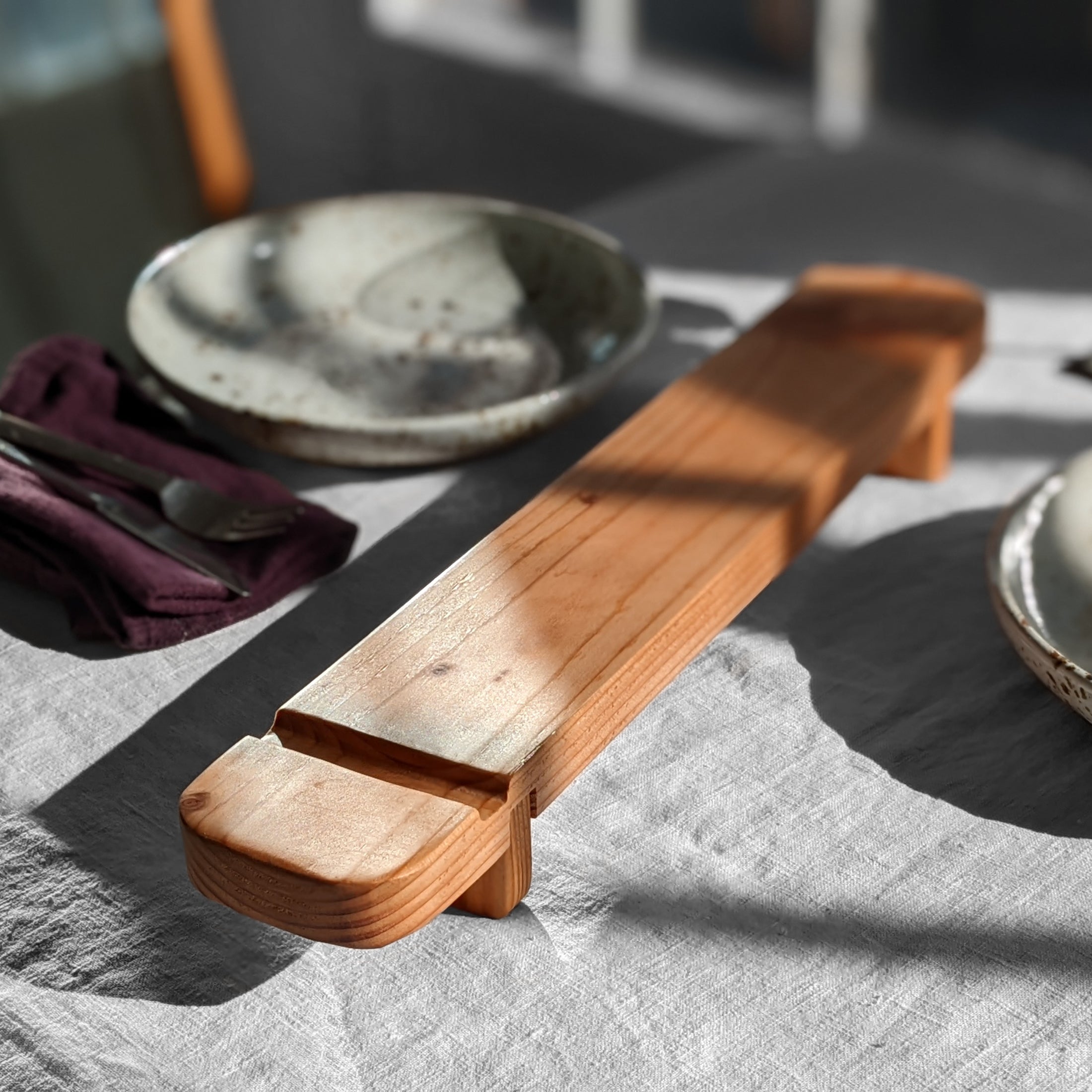 Handcrafted Charcuterie Board made from Doug Fir with a beeswax finish and a knife groove, measuring 18" x 3.25" x 2.25".