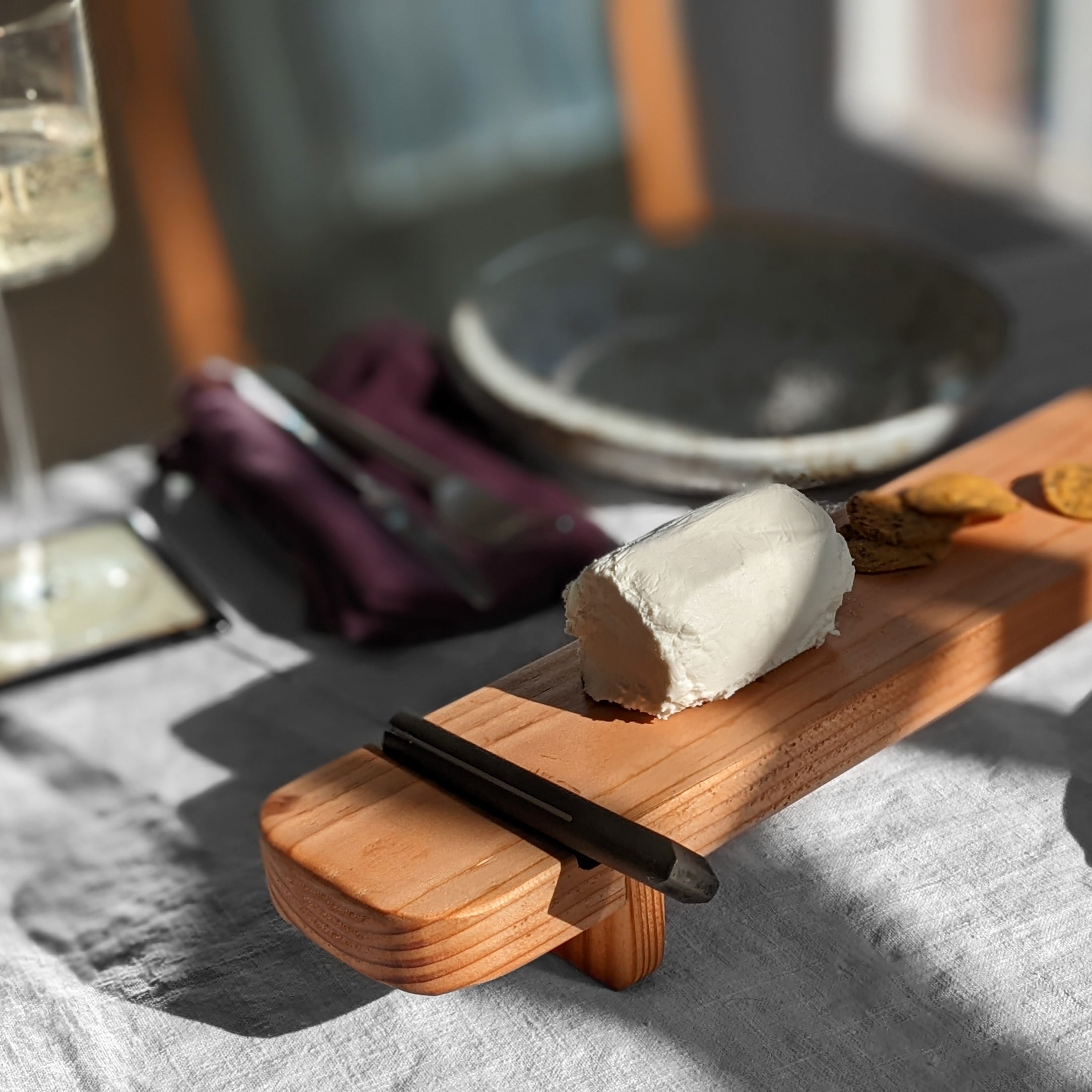 Handcrafted Charcuterie Board made from Doug Fir with a beeswax finish and a knife groove, measuring 18" x 3.25" x 2.25".