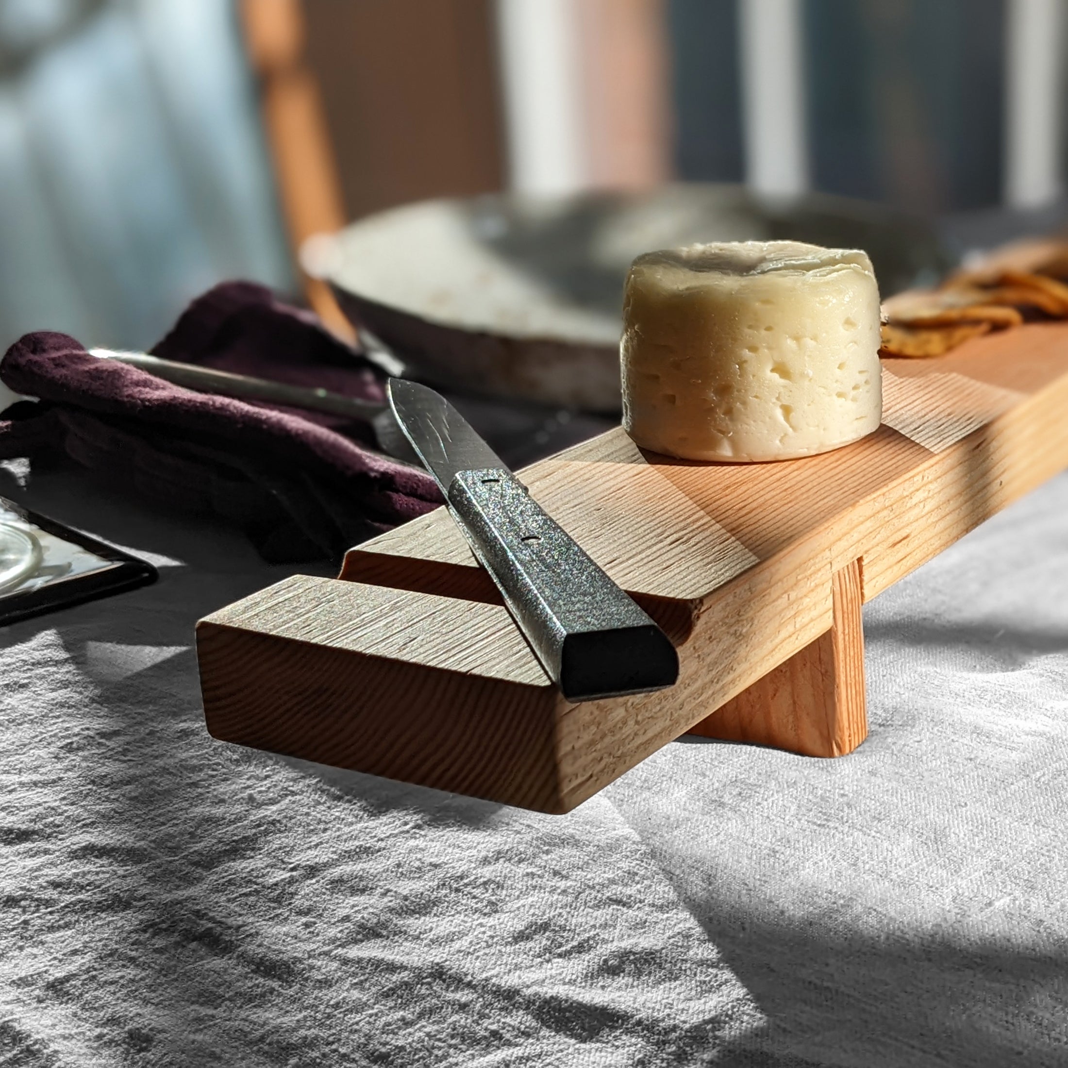 Charcuterie Board 2 made from Doug Fir with a beeswax finish, featuring a sleek design and knife groove for serving appetizers.