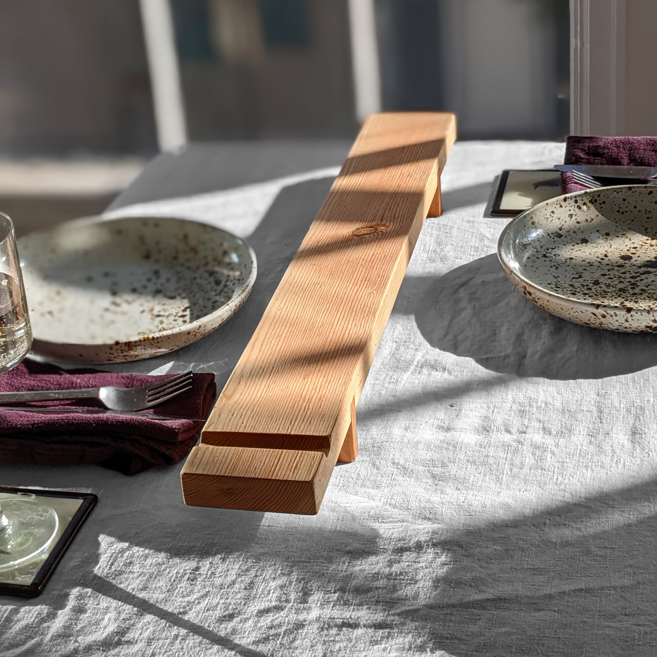 Charcuterie Board 2 made from Doug Fir with a beeswax finish, featuring a sleek design and knife groove for serving appetizers.