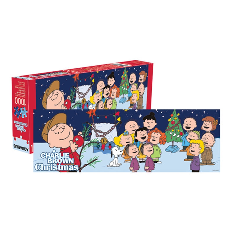 A colorful 1000 piece puzzle featuring Charlie Brown and Peanuts characters celebrating Christmas, showcasing a festive winter scene.