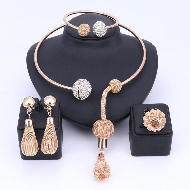 Charm Dubai Gold Plated Crystal Jewelry Set featuring a necklace, bracelet, earrings, and ring, elegantly designed for women.