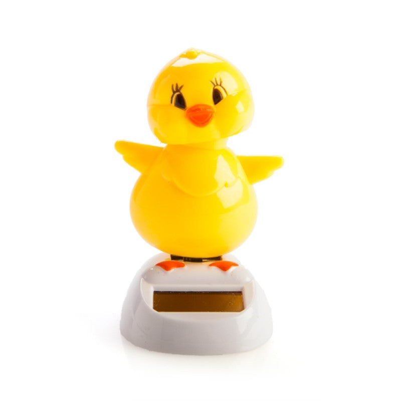 A cheerful yellow chick solar dancer swaying in sunlight, perfect for garden decoration.