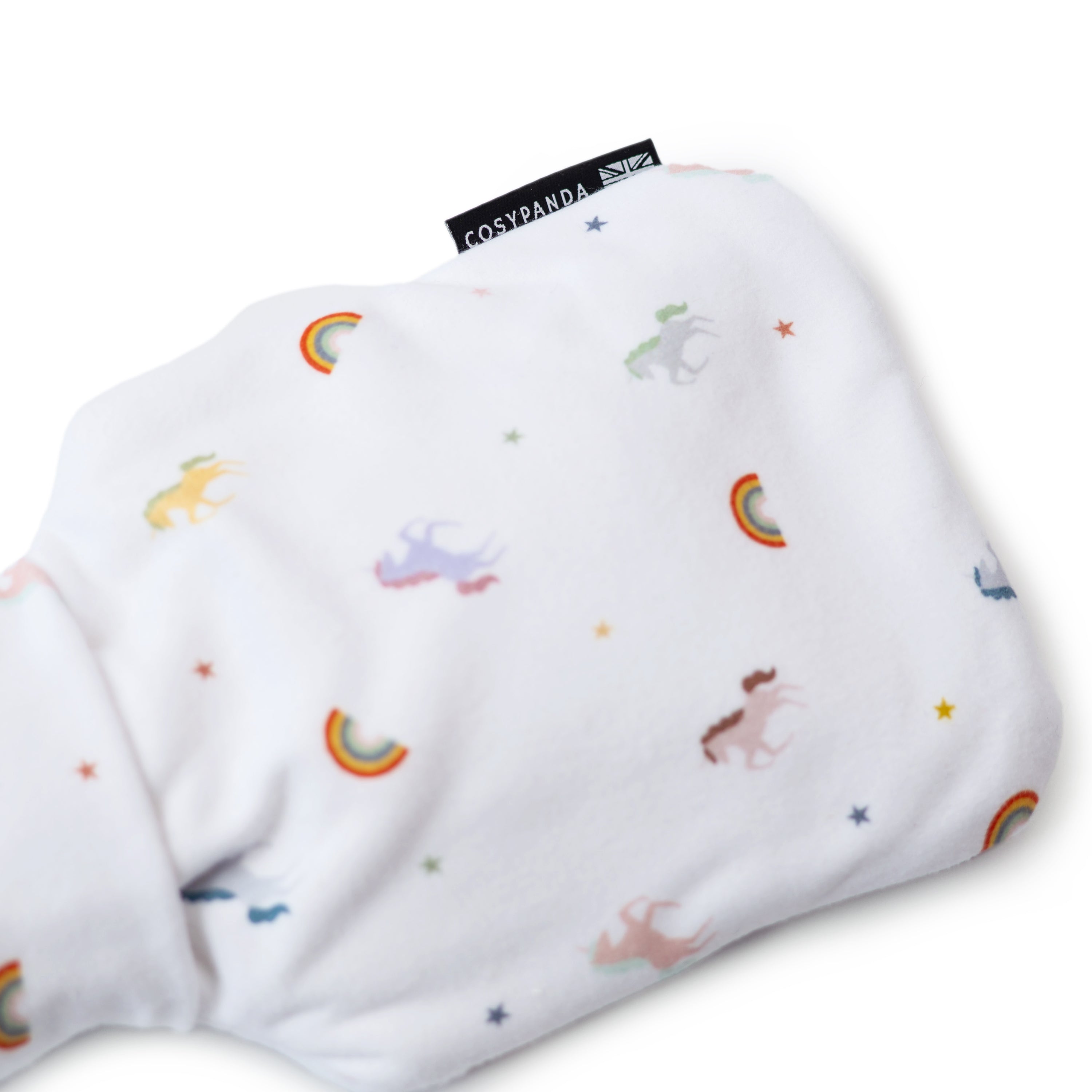 A soft children's hot water bottle featuring a colorful unicorn rainbow print, designed for comfort and safety.