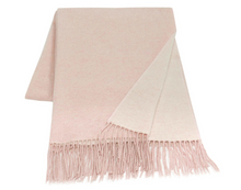 Chiswick Scarf in blush color, made from cashmere and merino wool blend, elegantly draped on a soft surface.