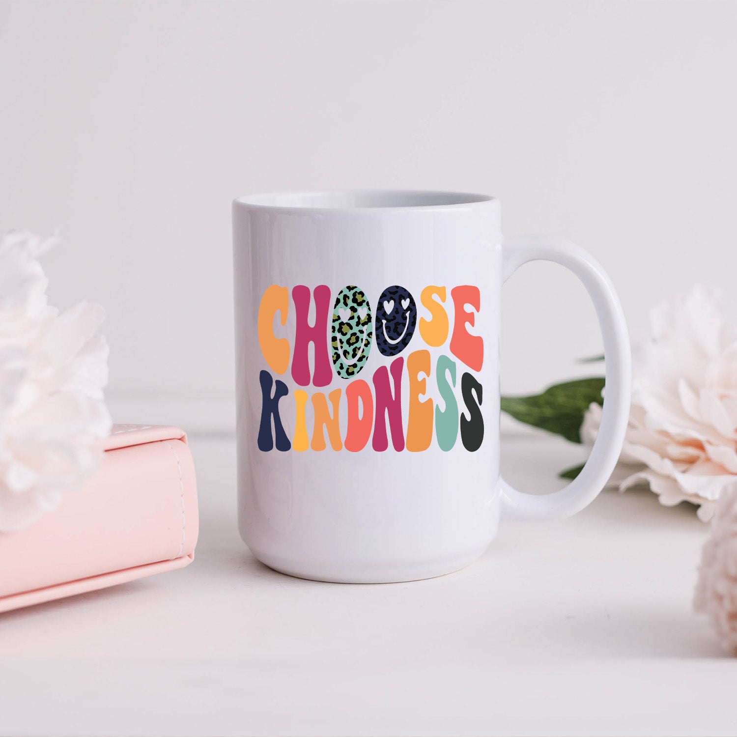 Choose Kindness Retro Smiley 15oz Mug with a glossy white finish and vibrant smiley print, perfect for coffee or tea.