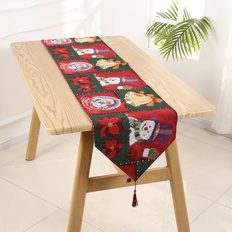 Christmas bell pattern table runner made of high-quality linen, featuring elegant design and hemmed edges for a festive table setting.