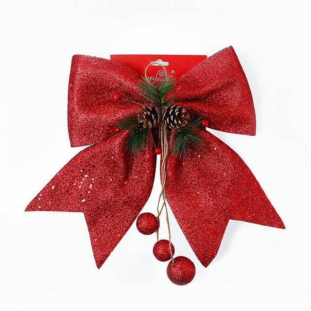 A beautifully crafted Christmas Bow featuring pine cones, perfect for tree decoration, showcasing its elegant design and festive colors.