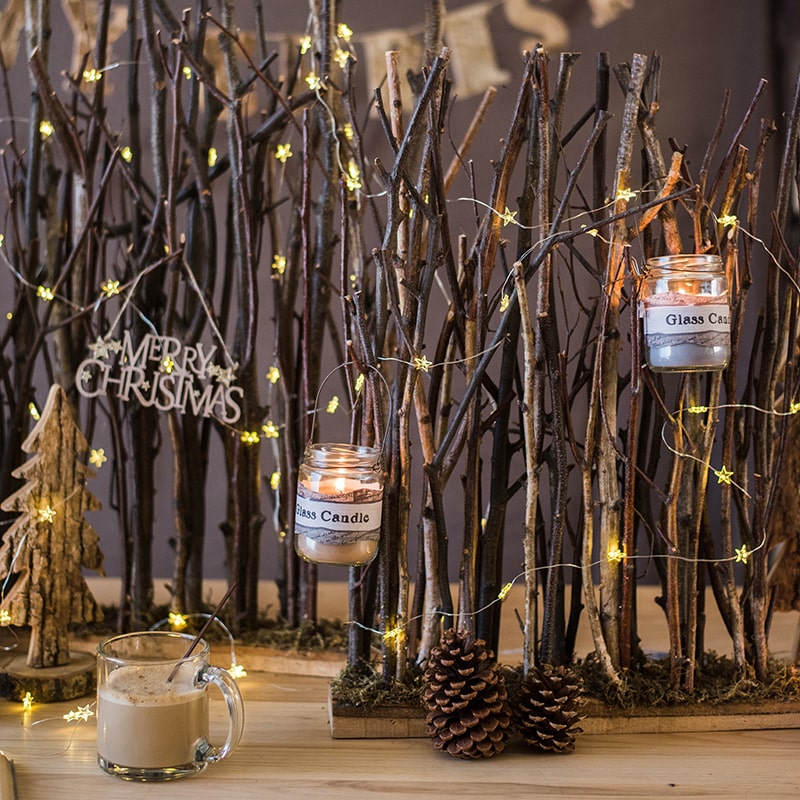 Christmas Branch Fence Decoration made from natural hazelnut wood and green moss, showcasing a rustic and festive design.