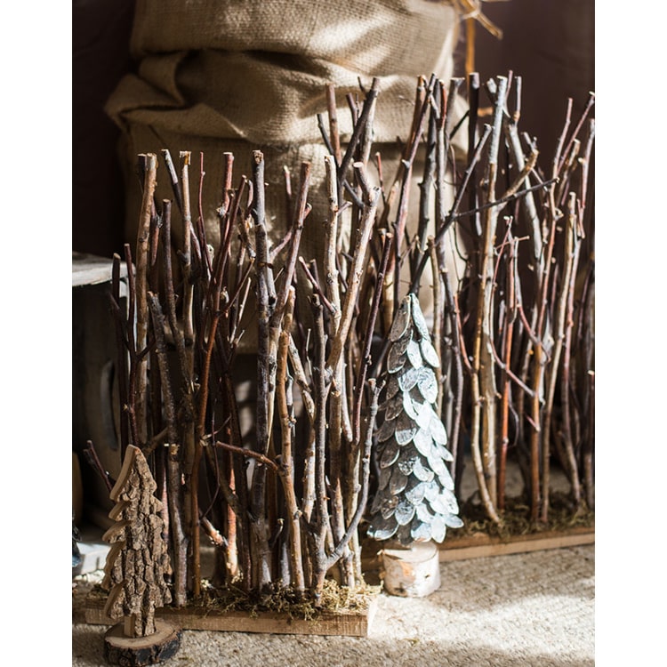 Christmas Branch Fence Decoration made from natural hazelnut wood and green moss, showcasing a rustic and festive design.