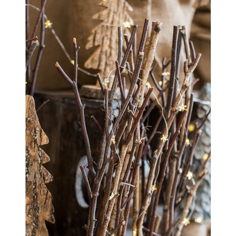 Christmas Branch Fence Decoration made from natural hazelnut wood and green moss, showcasing a rustic and festive design.