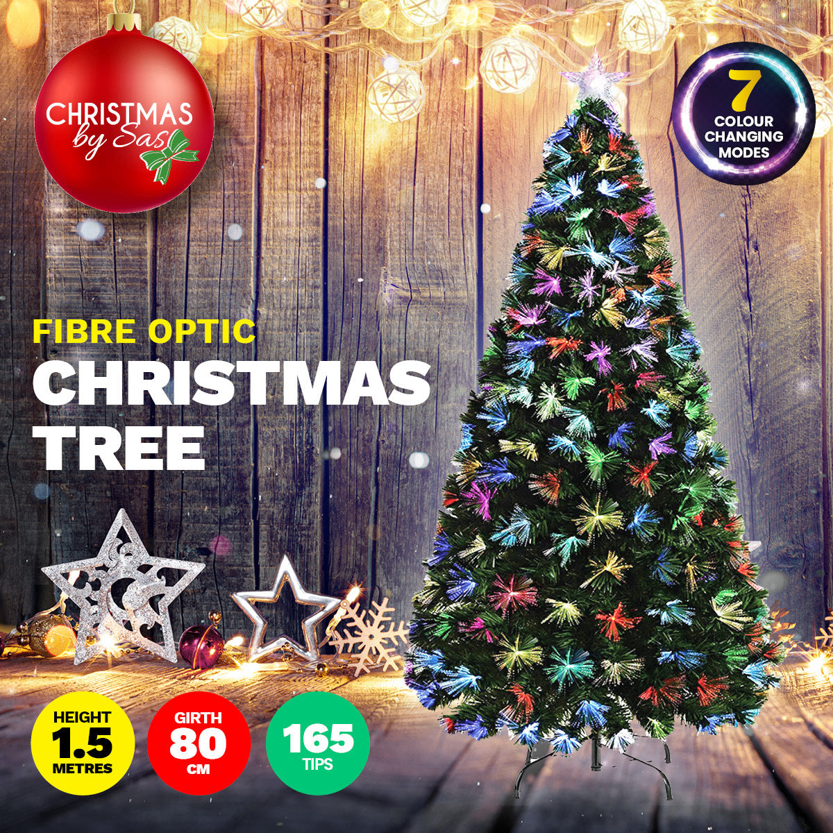 A beautifully lit 1.5m fibre optic Christmas tree with multicolour lights and a colour-changing star on top, set against a festive backdrop.