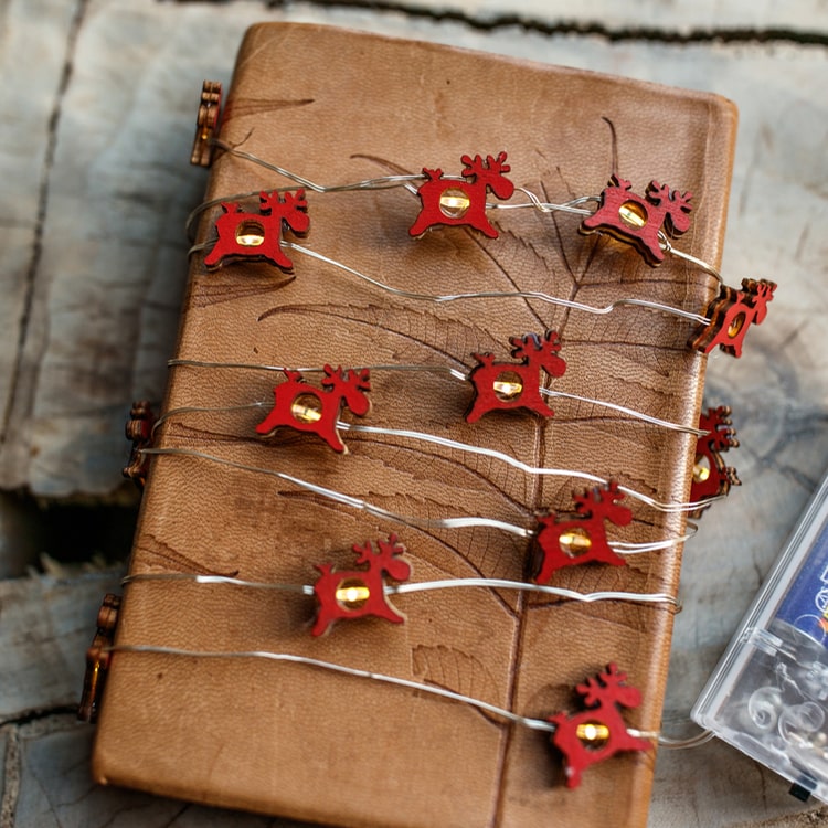 A string of 20 red reindeer lights, 78.7 inches long, perfect for Christmas decorations, showcasing a festive and whimsical design.