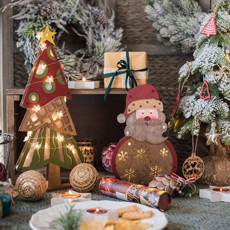 Christmas Decorative Wooden Light Box featuring Santa, snowman, and tree designs with LED lighting, perfect for holiday decor.