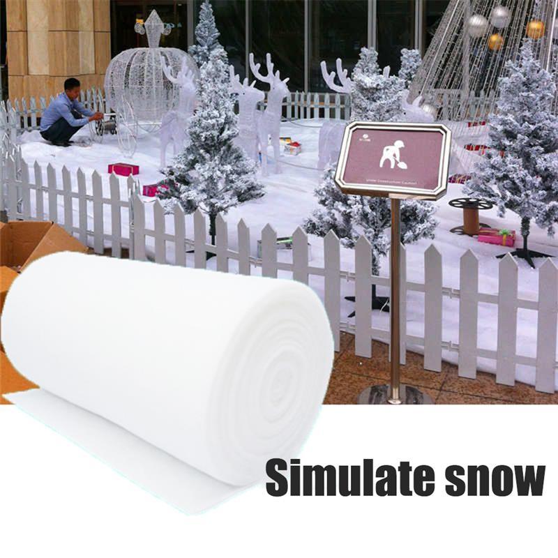 A fluffy white Christmas Snow Cover Blanket made of artificial cotton, perfect for holiday decorations and creating a winter wonderland atmosphere.