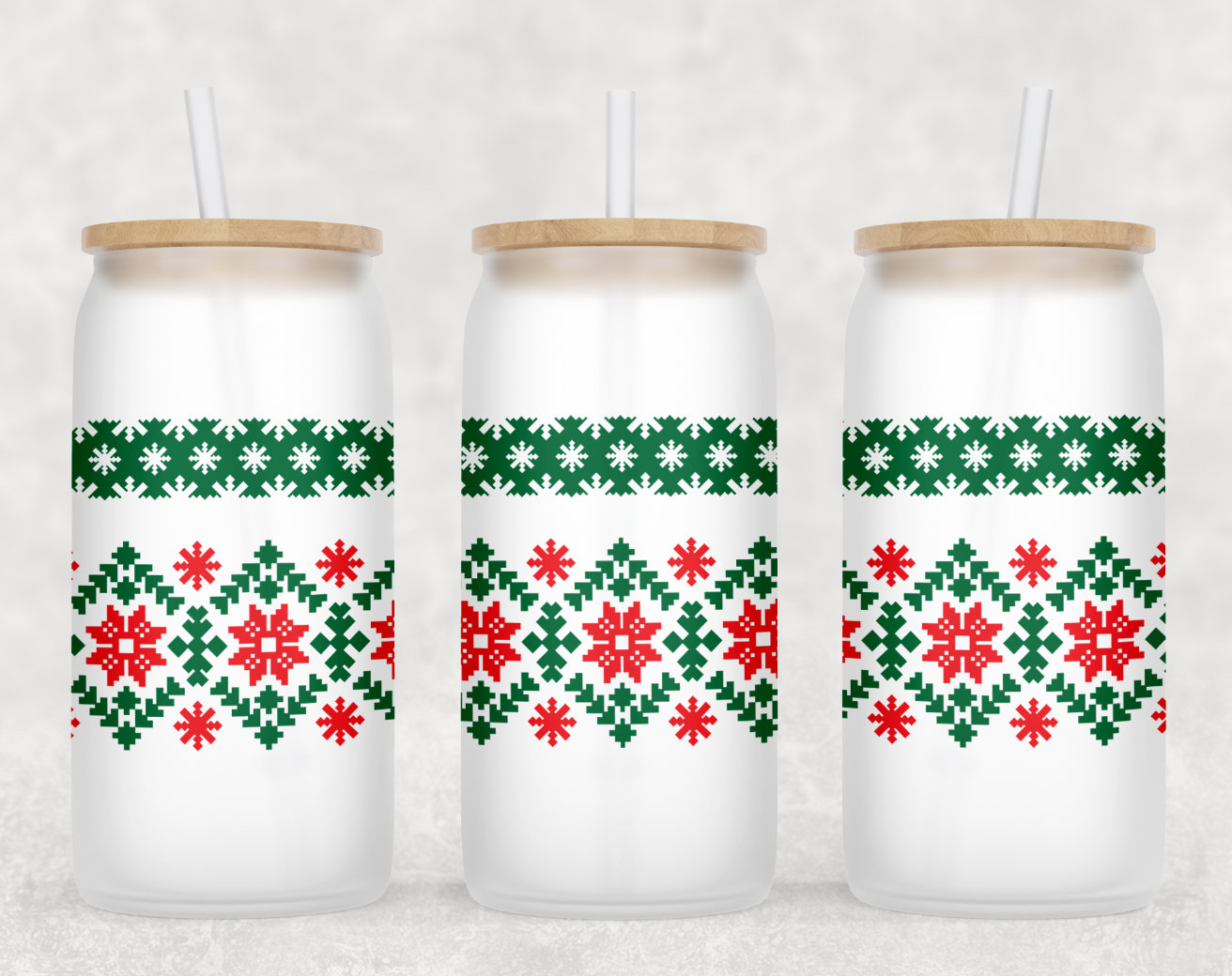 A festive Christmas Sweater Glass Can Tumbler with a bamboo lid and clear straw, showcasing a cozy sweater design.