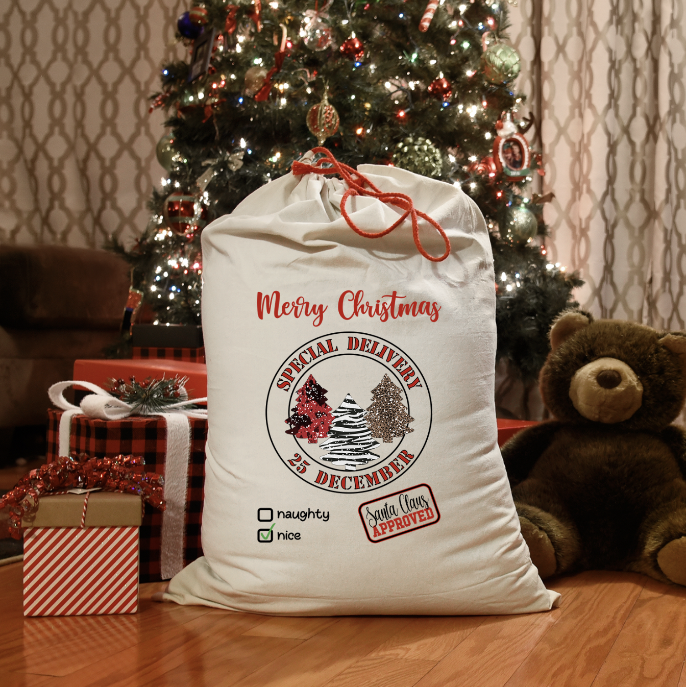 Personalized oversized Christmas Santa sack made of cotton canvas, measuring 19 x 27 inches, perfect for storing gifts.