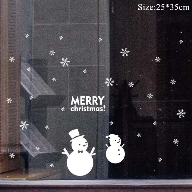 Colorful Christmas window stickers featuring Santa, snowflakes, and festive designs for holiday decoration.