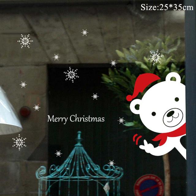 Colorful Christmas window stickers featuring Santa, snowflakes, and festive designs for holiday decoration.