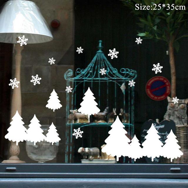 Colorful Christmas window stickers featuring Santa, snowflakes, and festive designs for holiday decoration.