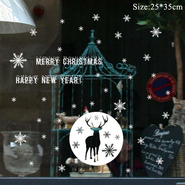 Colorful Christmas window stickers featuring Santa, snowflakes, and festive designs for holiday decoration.