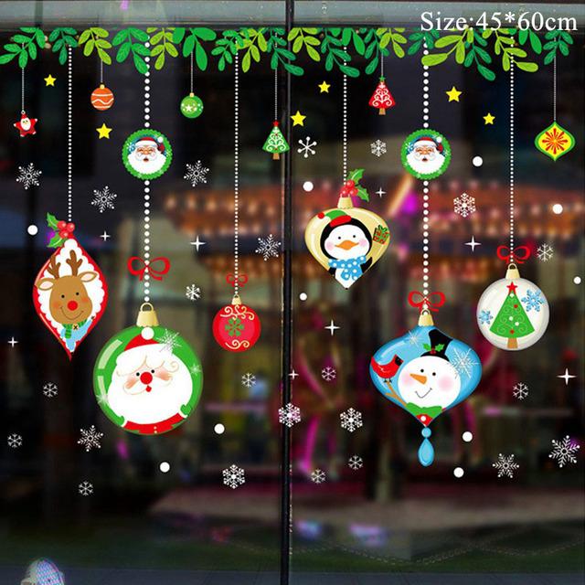 Colorful Christmas window stickers featuring Santa, snowflakes, and festive designs for holiday decoration.