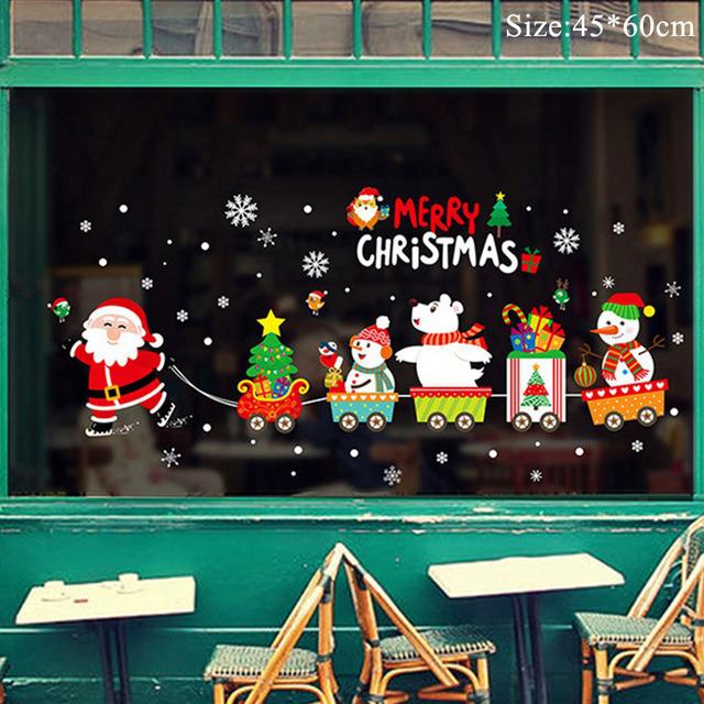 Colorful Christmas window stickers featuring Santa, snowflakes, and festive designs for holiday decoration.