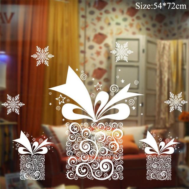 Colorful Christmas window stickers featuring Santa, snowflakes, and festive designs for holiday decoration.