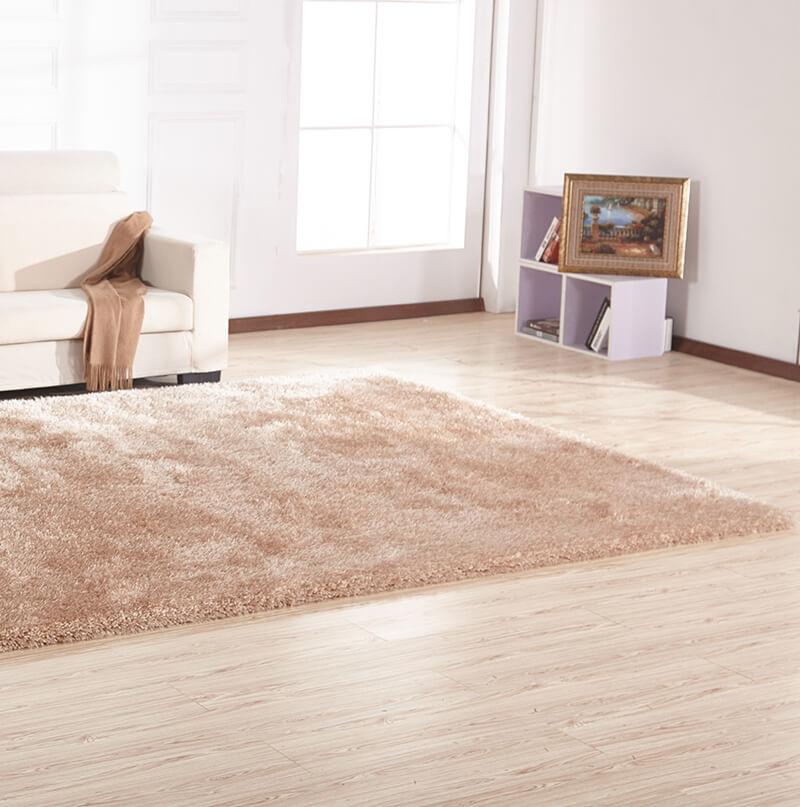 Chubby Beige Area Rug showcasing soft shaggy texture and solid color design, perfect for home decor.