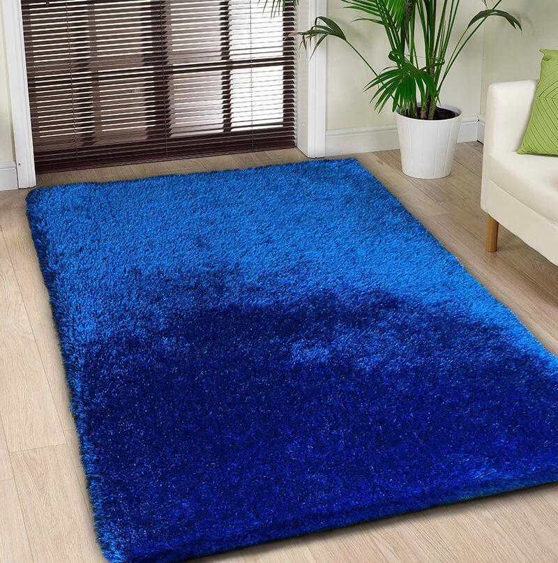 Chubby Blue Area Rug showcasing a soft shaggy texture in solid blue color, perfect for home decor.